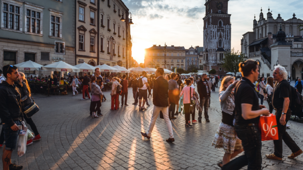 Busy European square at sunset, reflecting Netflix's reach into daily life globally