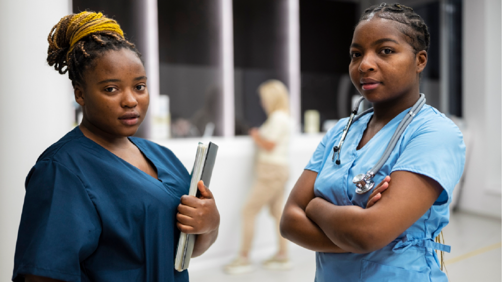 Two black female nurses Health and Care Workers