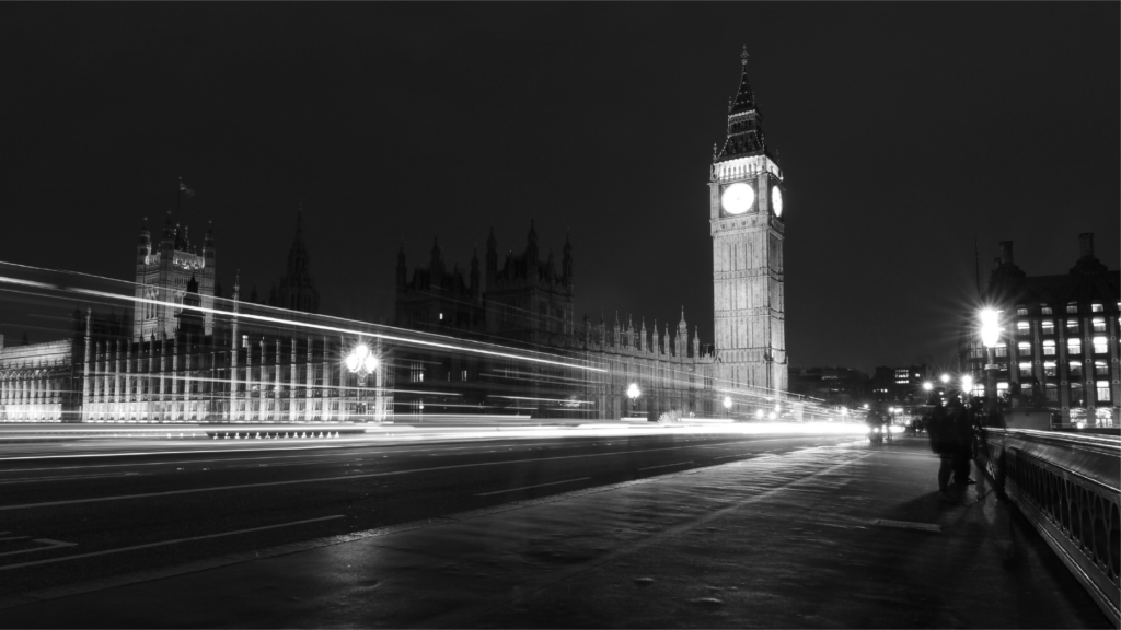 Westminster at night, the heart of UK policymaking. The UK Global Business Mobility Visa Explained. 
